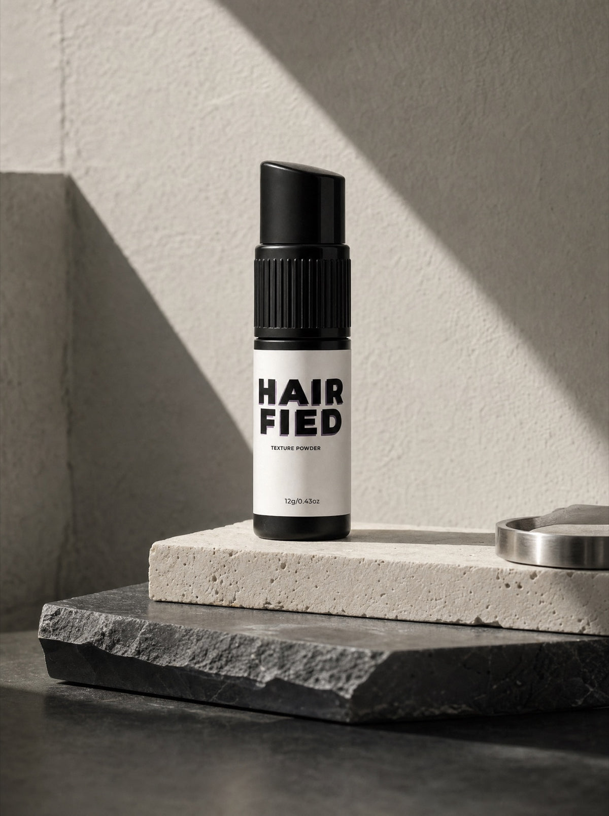 Hairfied Texture Powder on travertine and slate